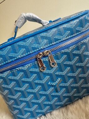 Blue Coated Canvas Muse Vanity Case with Chevron Pattern, structured Make Up Bag